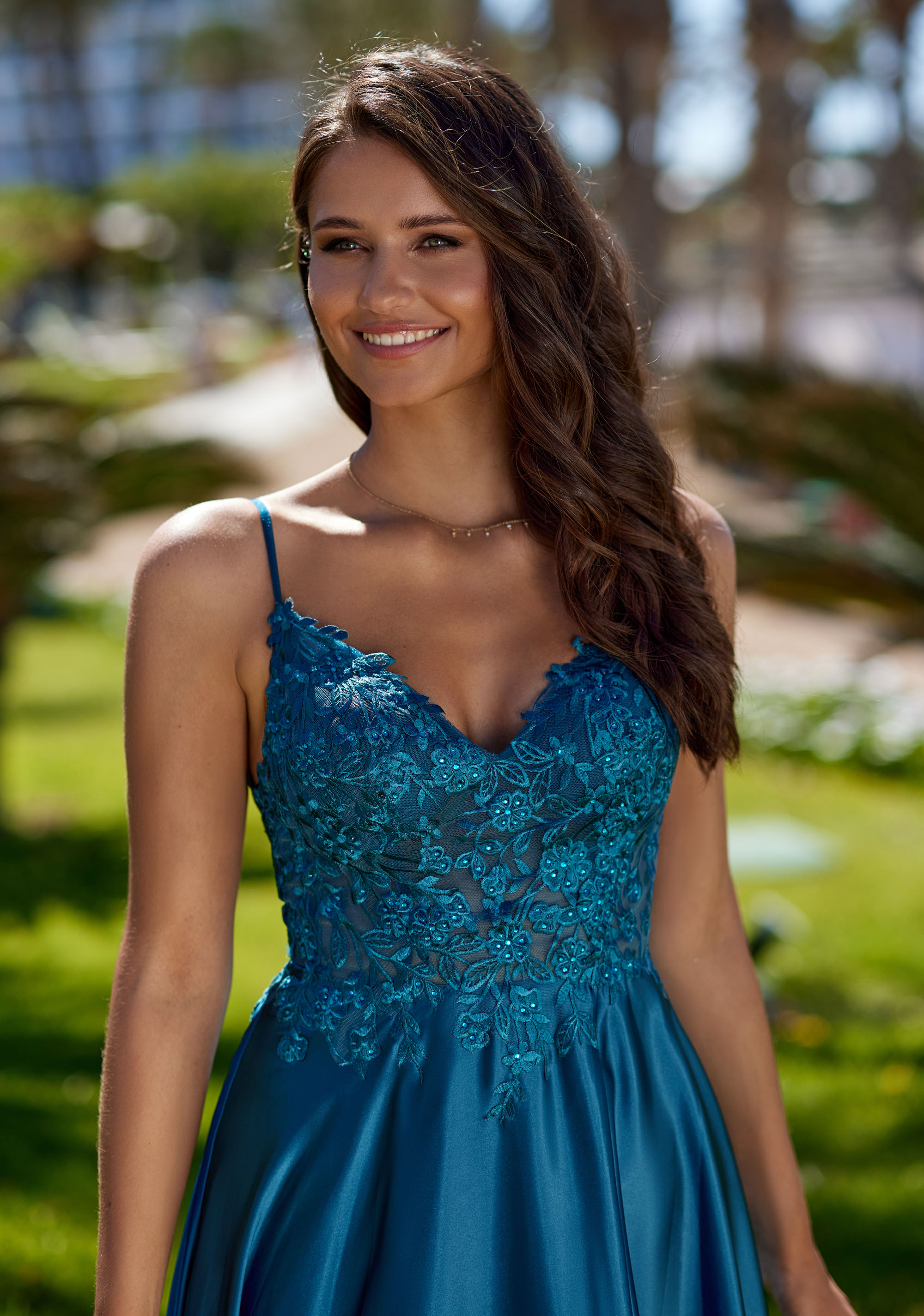 Satin evening dress in peacock green Christian Koehlert