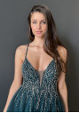 Evening dress made of tulle with rhinestones in botanical green